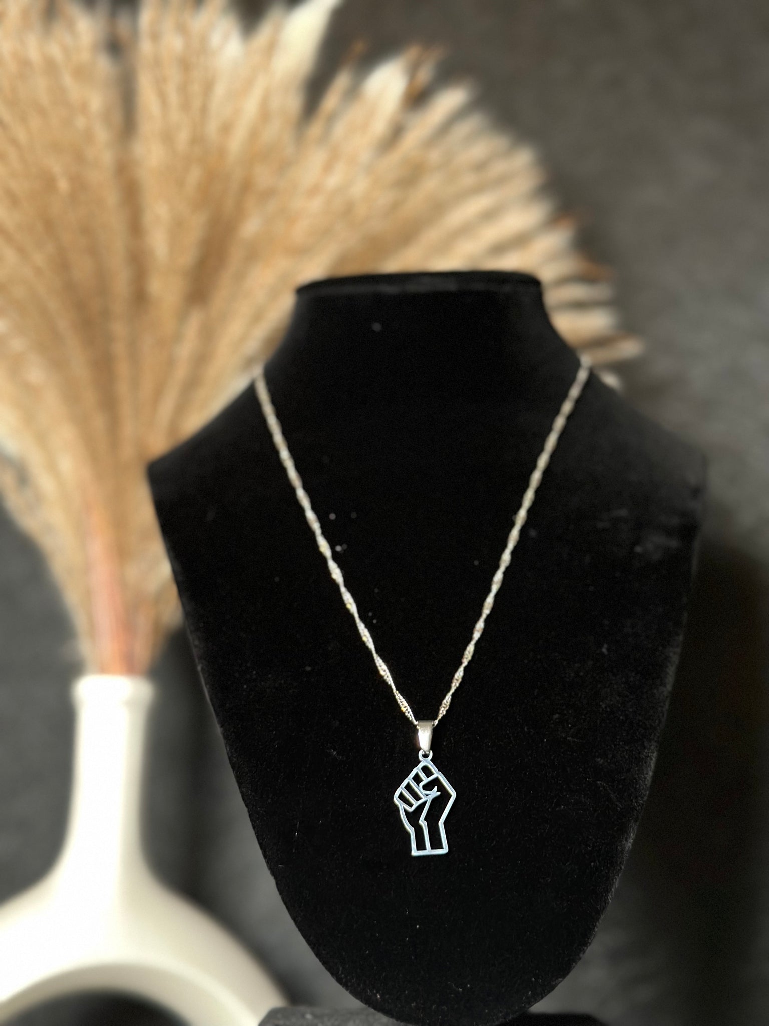 Fist Up necklace